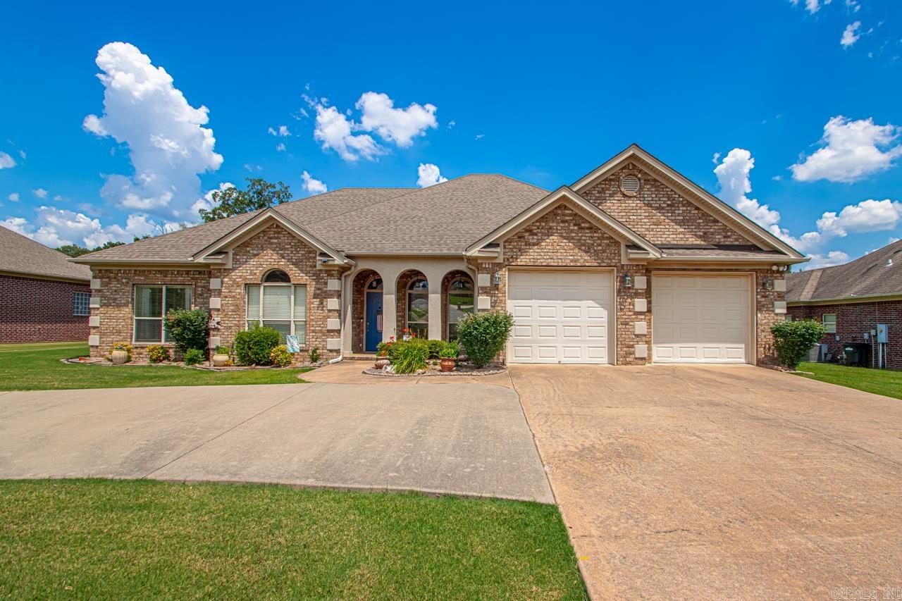 Welcome Home! You are just gonna love it! Big family room w/built ins! Dining area! Both have tall ceilings, wood floors & are open to each other! Separate office area w/glass doors...so nice! Kitchen has room for everyone to help cook & storage for everything! 3 bdrms w/split plan have new floors! Laundry room has a home office area w/builtins! There is even a homework area! 12X16 workshop wired for electricity! Circular drive! HVAC 2018 & serviced twice yearly! HWH 23! Nice level lot w/big back porch! I am telling you.. It feels just like home! It has been loved on! Come see today!