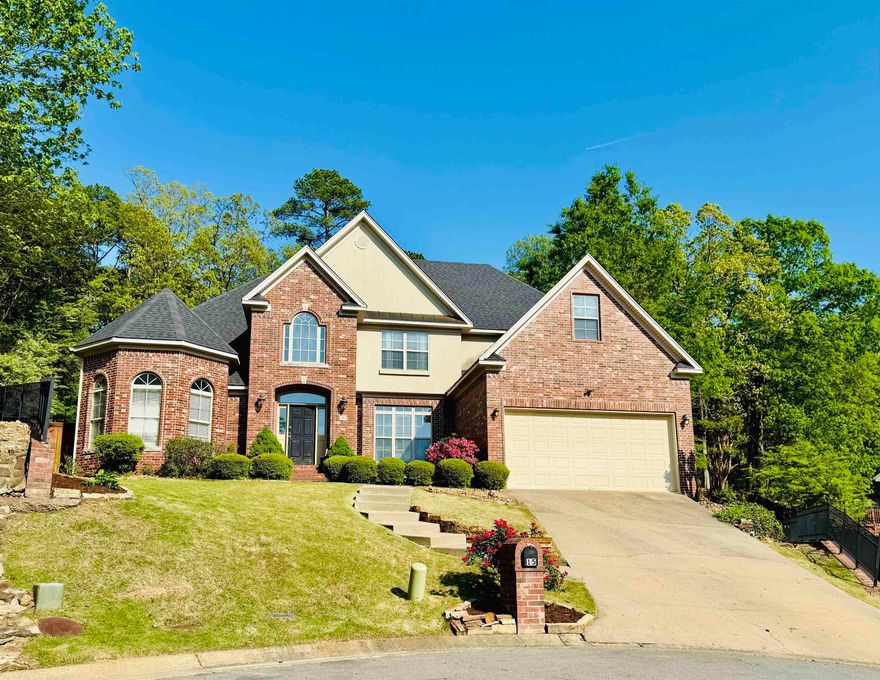 This beautiful home is located in a quiet cul-de-sac. As you enter through the inviting foyer, you'll find an office and a formal dining room. The spacious great room features a tall ceiling, a wood-burning fireplace, and French doors that lead to the patio.  The primary suite includes a sitting area and an ensuite bathroom with double vanities, a separate shower, a jetted tub, and ample closet space. The impressive kitchen boasts stainless steel appliances, granite countertops, and a breakfast bar that overlooks the hearth room, which also features a wood-burning fireplace and French doors opening to the deck. Additionally, there is a separate breakfast room, a laundry room, and a half bath on the main level. Upstairs, you'll find three bedrooms, two bathrooms, and a bonus room. Enjoy the privacy of the patio and two decks, one of which features a large hot tub. Come see this wonderful home!