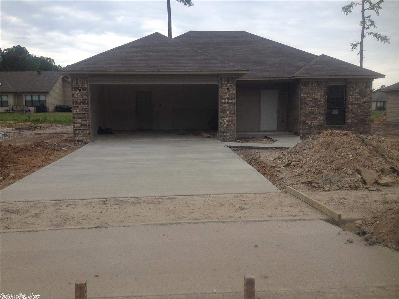 Adorable home with an unbelievable price for new construction in the City. Open floor plan with great room opening to kitchen/dining area. Stained cabinetry, nice counter tops, ceramic tiled floors in kitchen, baths and laundry room. Master has walk-in closet. Level lot with patio. Hurry to see it because it won't last long!
