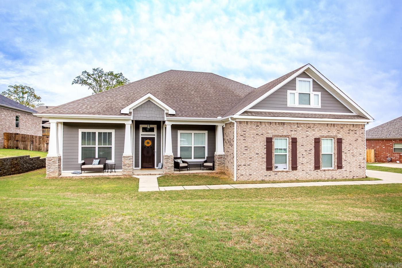 MOTIVATED SELLER!  Gorgeous does not begin to describe this 5 bedroom PLUS OFFICE, 3 bath home with a perfect modern touch!  Located in the subdivision of Greystone, this spacious, elegant, open floor plan is everything you are looking for!  White kitchen cabinets, granite countertops, double sinks in primary bathroom.  Large primary closet opens to laundry!  The beautiful stone fireplace makes you feel at home as soon as you walk through the door.  The 5th bedroom has its very own full bath and could also be used as a bonus room.  If you like to entertain, or enjoy your evenings outside under a nice, covered patio and fenced back yard, this home is for you!  Seller has added the following:  New Bosch dishwasher, added 3rd zone to A/C (2 downstairs, 1 up), added smart Wifi switches throughout house, added surge protection (MSP), and added 2nd downstairs return on HVAC.