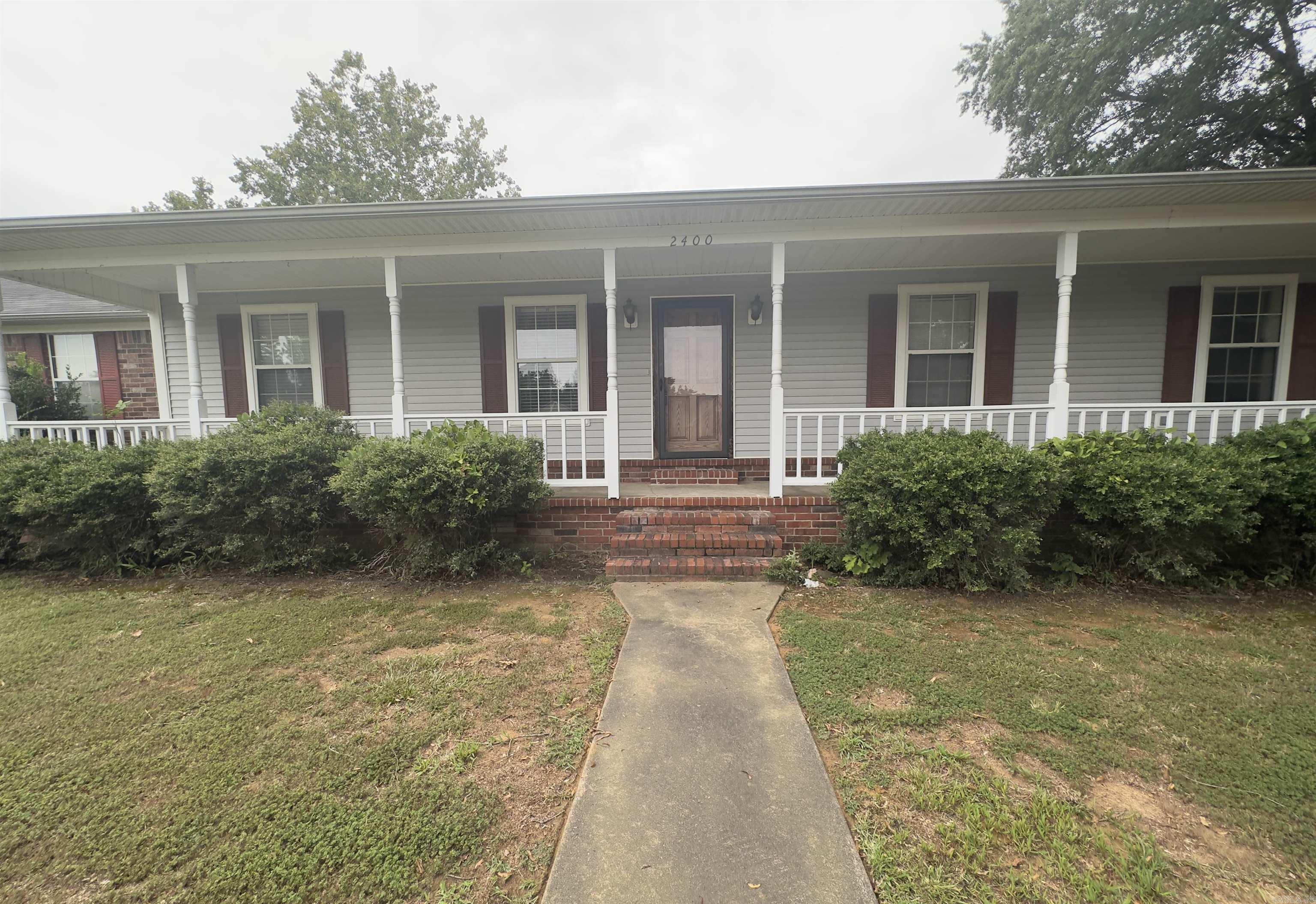 Welcome to this spacious ranch-style 4 bedroom, 3 bathroom home situated on a desirable corner lot in Searcy, Arkansas! Featuring a charming front porch perfect for morning coffee or evening relaxation, this home offers the ideal blend of comfort, space, and potential. Inside, youāll find two full kitchens, two living areas, and two laundry rooms, making it perfectly set up for in-law quarters, guest accommodations, or even rental possibilities. Whether you're housing extended family or looking for flexible living space, this layout delivers unmatched versatility. All rooms are generously sized, offering endless possibilities for customization. With just a little TLC, you can transform this property into a fabulous forever home or a smart investment opportunity. Donāt miss out on this rare findāranch-style charm, multi-generational layout, and a great location close to everything Searcy has to offer!