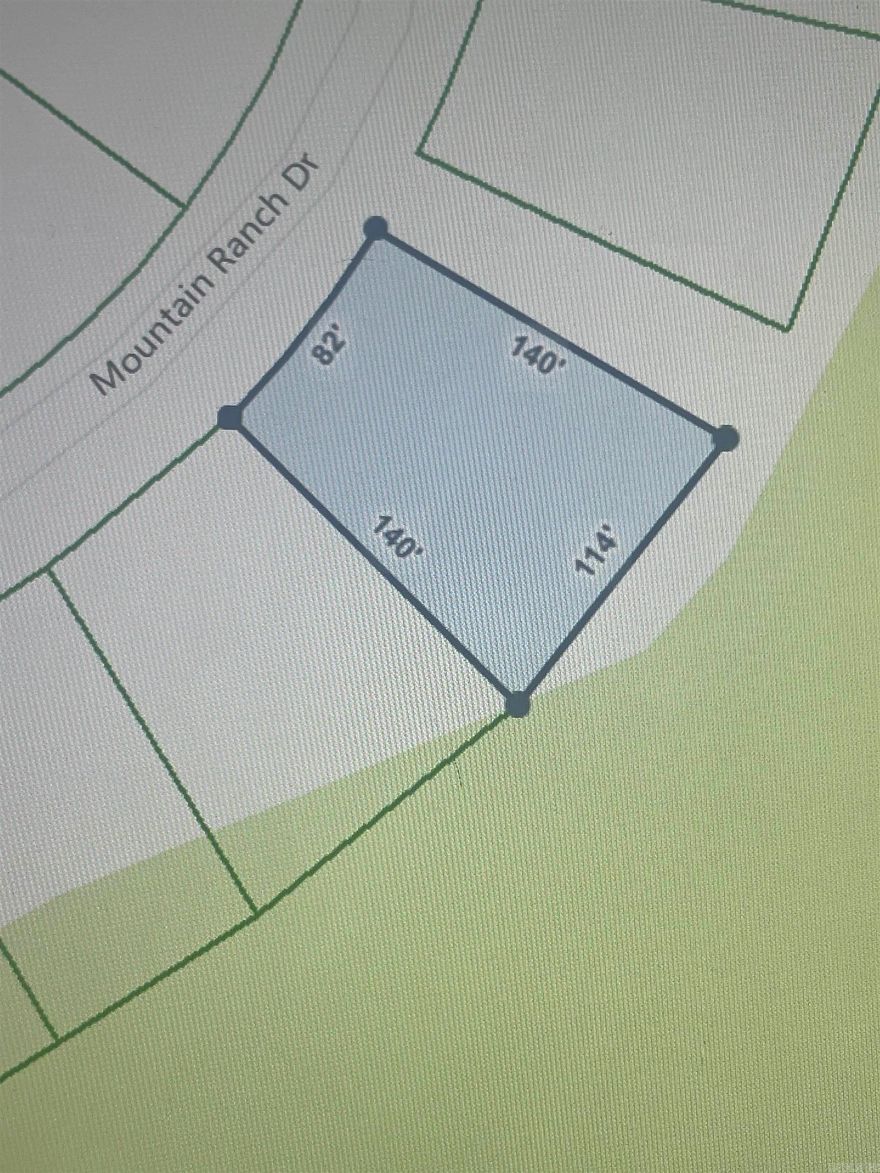 Come build your dream home today on the golf course frontage lot. Enjoy living in Fairfield Bay, where every day feels like a vacation! Nestled amidst the picturesque landscapes of the Mountain Ranch Golf Course, this area offers you the perfect blend of relaxation & adventure.  With this prime location, you can indulge in your passion for golf anytime you desire. Tee off during the day & as the sun sets, bask in the breathtaking views of the shimmering lake nearby. This is the epitome of tranquil living at its finest. But that's not all! Fairfield Bay boasts a plethora of amenities to enrich your life. Within minutes of your new abode, you'll find a full-service marina, beckoning you to embark on aquatic adventures whenever the mood strikes. Dive into the refreshing waters of one of the three swimming pools, or challenge your friends to a game of tennis or pickleball. Feel the thrill of exploration as you traverse the hiking & biking trails, or opt for a leisurely round of miniature golf or disc golf. With over 80 miles of UTV trails at your disposal, the possibilities for outdoor recreation are endless.  Buyer to pay all closing costs and title insurance.