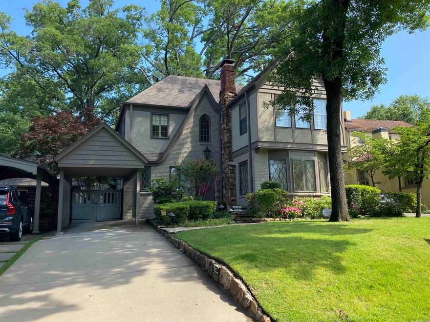 Storybook cottage in the Prospect Terrace Neighborhood. Two-story home with one car carport & guest house (not included in sq ft). Beautifully remodeled with designer touches, custom wood blinds & updated baths and kitchen. Stainless Steel appliances. Large windows. Lots of light. Pretty hardwood floors. Gas fireplace. Nicely landscaped backyard with patio and play area. Super special with Charm galore!