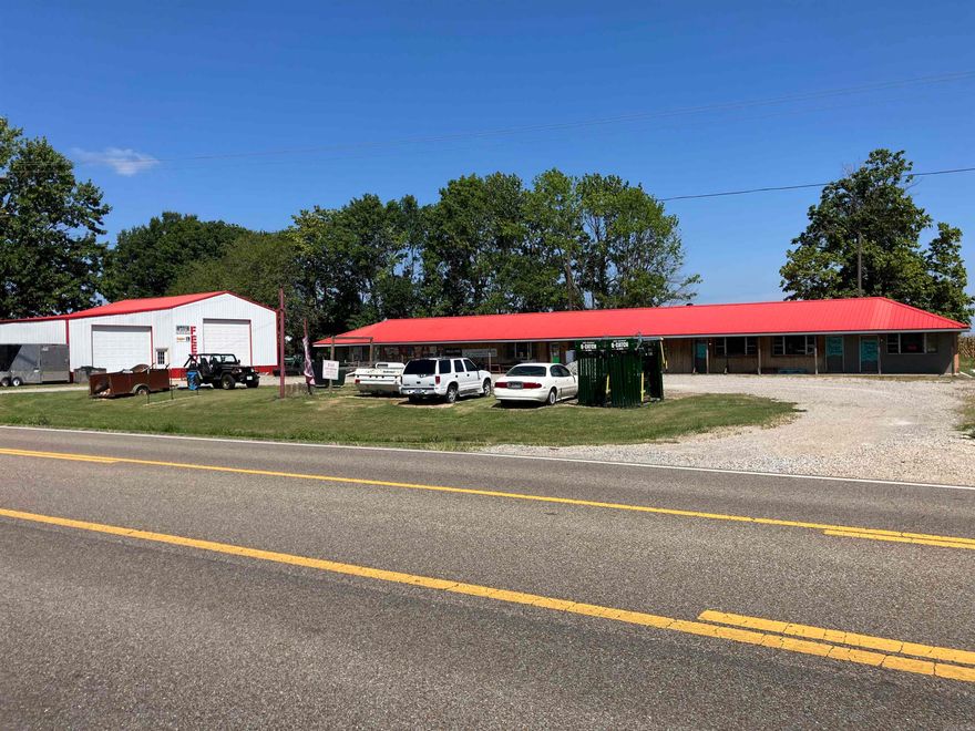 1430 East Main St. in Piggott, Ar. is a one-acre lot with 266' of highway frontage. It comes with 2 buildings. 1 building is 3,856 sq ft that is currently being used as a clothing and boot store. The other building is 54'x44' steel building with 16' drive through roll up doors that is currently being used for the feed store.