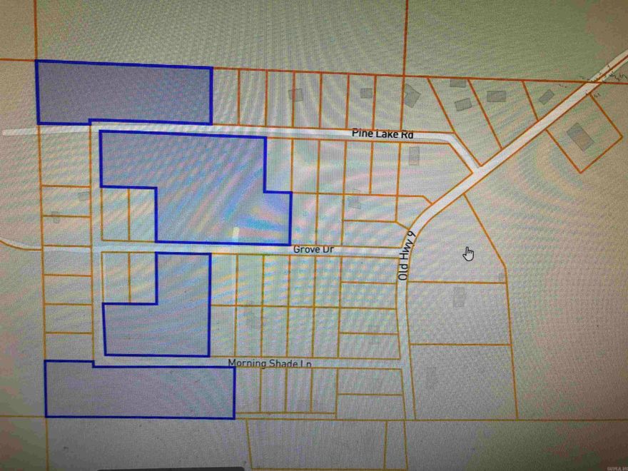 13.74 wooded acres only minutes from the Clinton Walmart. Property was subdivided into 27 lots. Survey on hand for lots. Taxes on 27 lots was high so the owner combined all 27 lots and converted back to acreage and taxes dropped to only $16 /year. Currently zoned R-2   Seller wants to sell all 27 lots as one.  Seller is related to Listing Agent. Mineral rights do not transfer.