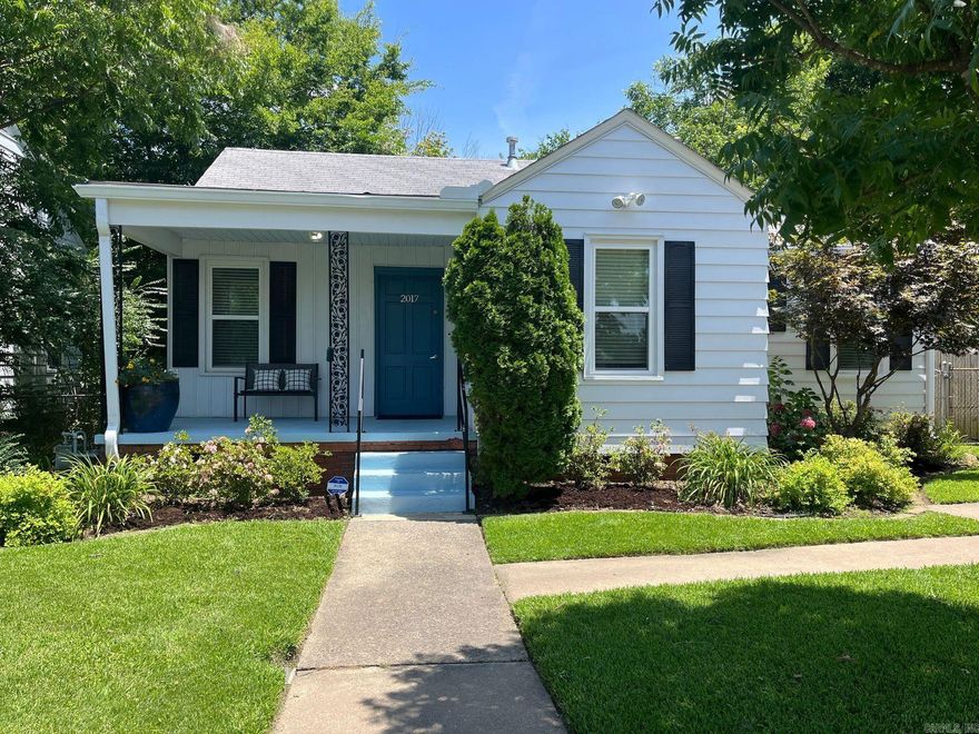 Adorable Cottage/Bungalow one level in the Heights just a 5 minute stroll to all the activities the Heights offers on Kavanaugh! So many updates in this inviting, light & bright 2 bedroom/1 bath home with separate dining room and an office nook in the kitchen. See attached docs for full list of updates!  GREAT, deep lot, fully fenced with large storage building/shed.  Curb appeal galore.  Deep and wide front porch to watch the moon and the stars at night.  Close to everything!  Happy kitchen ready for culinary creativity and offers direct access to the backyard for grilling. Much of the original charming details were preserved in the remodeling and updating and this doll house is ready for its next chapter.  Two car driveway parking pads. Good Earth designed and installed professional landscaping and sprinkler system. Security system.