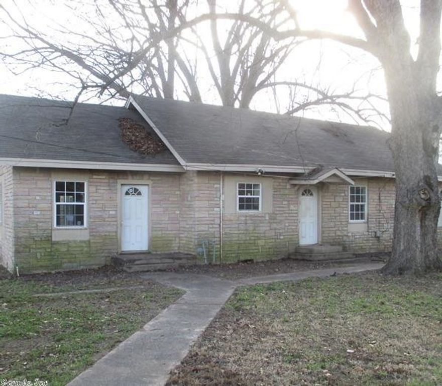 Don't miss this home!  This 3 bedroom, 2 bath home on a corner lot.  This home has french doors that open up to the backyard.  Bathrooms have been updated.  Laminate flooring through most of the home.  Master bathroom has jetted tub.  Kitchen has lots of cabinets.  Taxes are before homestead! **AGENTS see remarks**  Call today for your personal tour!