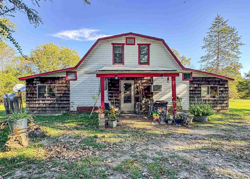Charming Country home on 8 acres in the Ozarks! Escape to the peace and beauty of the Ozark mountains with this 2-bedroom, 2 bath farmhouse offering 1,856 square feet of comfortable living space. Nestled on 8 private acres, this property combines rustic charm with modern convenience-perfect for those seeking a quiet country lifestyle. Inside, you’ll find a warm, open layout featuring a spacious living area, country kitchen, and plenty of natural light throughout. Enjoy cozy evenings on the porch while taking in the surrounding hills and wildlife. Amenities include a private well and septic, a spacious shop building with 220 power and plenty of room for gardening, livestock, or recreation. Located in the heart of the Ozarks, you’ll appreciate the serene setting with easy access to nearby lakes, rivers, and small-town amenities. Whether you’re looking for a full-time residence, weekend retreat, or hobby farm, this property is ready to welcome you home. Come enjoy country living at its finest! Call for showing today.