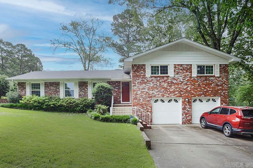 Under Contract Before Listed. Lovely Leawood home on corner lot!  4 Bedrooms/ 3 Bathrooms.  Large updated kitchen that is open to the cozy den with fireplace.  Formal dining and living room.  Lots of updates that include new windows, kitchen and bathroom remodels.  Wonderful screened in porch with additional deck area- perfect for entertaining.  Two car garage.  This property sits on 2 beautiful and lush lots with sprinkler system.  Walk to the neighborhood pool and park.