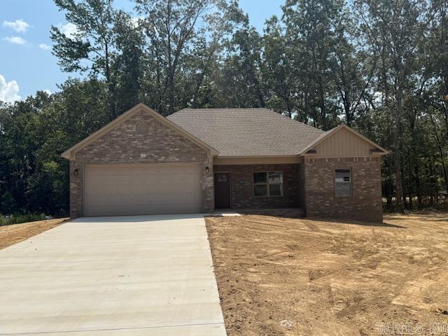 Looking for a new home in a quiet cul-de-sac. This is it! Large living room open to the kitchen. Nice sized island in the kitchen with cabinetry in the island. Guest rooms are separate from the primary bedroom. Has a nice yard with trees. The backyard is private with woods behind the home.