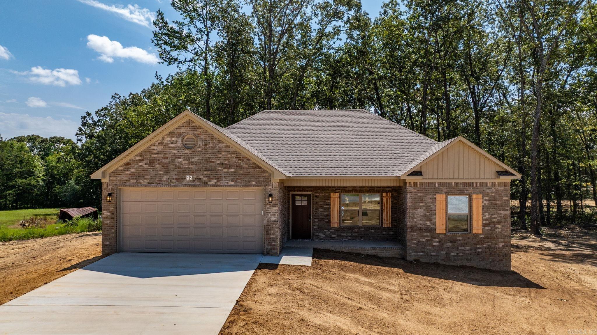 Looking for a new home in a quiet cul-de-sac. This is it! Large living room open to the kitchen. Nice sized island in the kitchen with cabinetry in the island. Guest rooms are separate from the primary bedroom. Has a nice yard with trees. The backyard is private with woods behind the home.