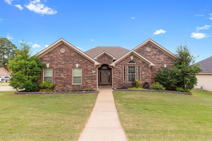 Welcome to 2104 Magna Carta Ln. The perfect blend of comfort, convenience, and charm in the heart of Bryant! This 4-bedroom, 2-bath home offers 1,871 sq ft of inviting living space with an open-concept design and a desirable split floor plan that provides both functionality and privacy. Whether you're hosting guests or enjoying a quiet night in, the spacious layout and cozy atmosphere make this home ideal for entertaining. Step outside to a beautifully maintained yard—perfect for weekend barbecues, pets, or play. Located just minutes from shopping, dining, and with easy access to the highway, this home combines small-town feel with big-time convenience. Don't miss your chance to own this gem in one of Bryant’s most sought-after neighborhoods!