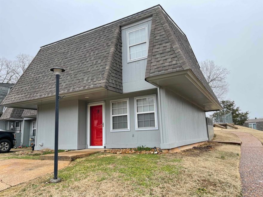 Charming 2-level end-unit townhome in Cherokee Village—move-in ready and ideal for full-time living, a vacation getaway, or investment property! Walking distance to Lake Thunderbird and the scenic Spring River.  Enjoy peace of mind with major upgrades in 2023, including a new heat pump, roof, windows, storm doors, and water heater. Inside, beautiful cedar wood throughout creates a warm, cabin-style feel with modern updates. Relax by the electric fireplace on cool evenings.  This end-unit offers extra privacy with only one shared wall, plus more natural light from additional windows. Step outside to your private patio—perfect for morning coffee or evening relaxation.  Community amenities include outdoor and year-round heated pools, 7 lakes, 2 championship golf courses, walking trails, and parks. Whether you're looking to unwind or explore, this vibrant community has it all. Excellent potential for VRBO or short-term rental income!