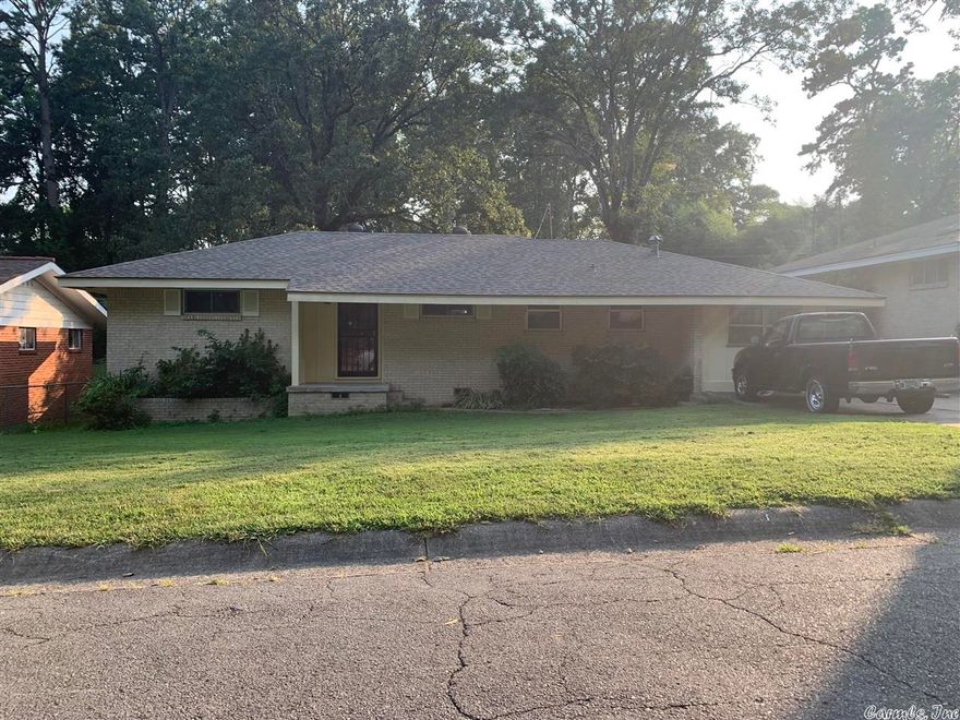 Fresh paint interior & exterior, new flooring in the kitchen, office and laundry, beautiful original hardwood floors in entry, living area, eating area and bedrooms.  New Roof.