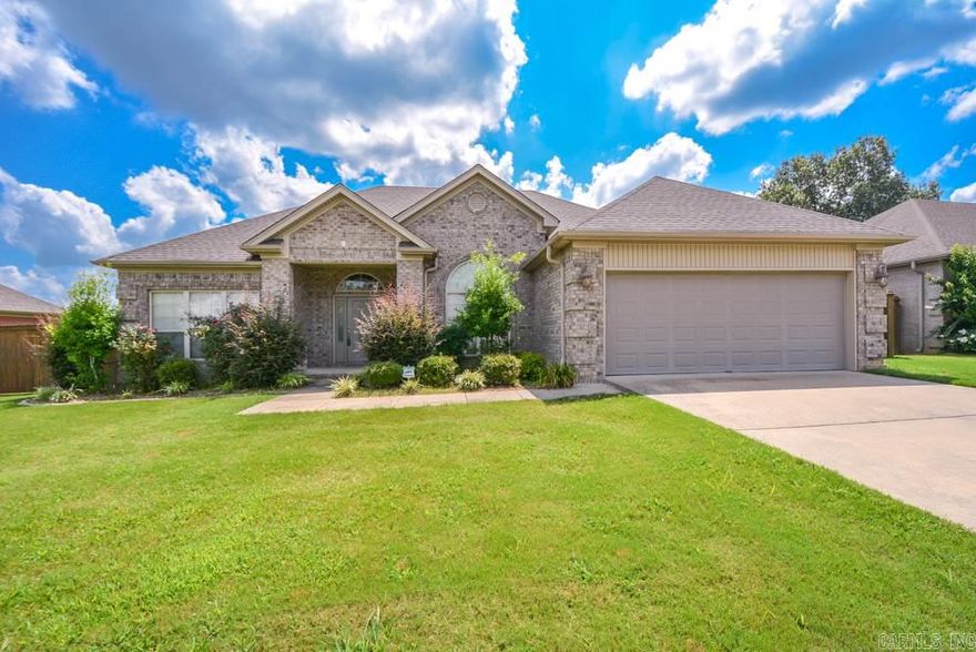 All brick beauty in Southern Comfort. Built by original developers. Gorgeous wood flooring, corner fireplace, adjoining dining area with 15' ceiling fans as you enter the front door. Kitchen has plenty of cabinets, small breakfast bar and solid surface counter tops. Master has trey ceilings, 2 walk in closet, jetted tub and walk in shower. Wood privacy fence surrounds backyard covered porches. New roof in 2017.