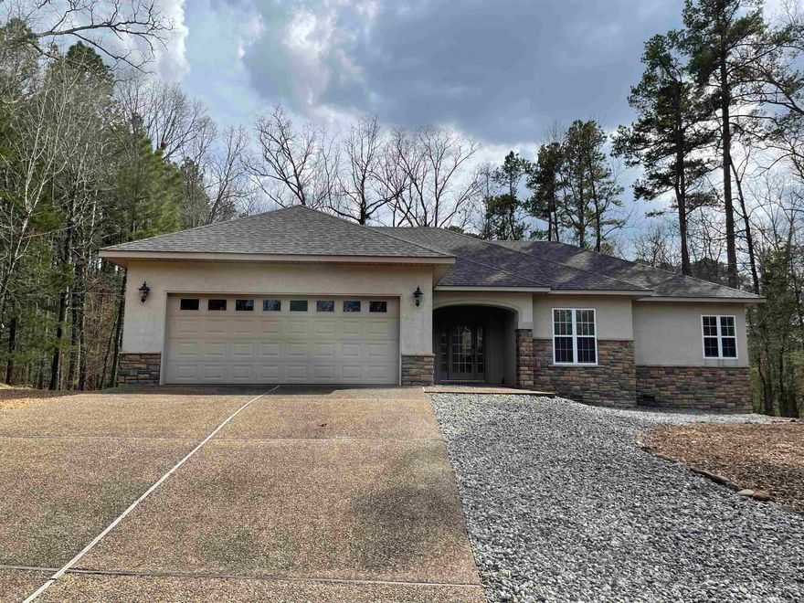 WITHIN STEPS OF ISABELLA GOLF COURSE.  HOT WATER HEATER REPLACED 2023, REFRIGERATOR REPLACED 2014, HEAT PUMP REPLACED 2018, DECK IS NOW A TREX DECK WITH METAL  SPINDLES, WASHER REPLACED 2019, NEW ROOF TO BE REPLACED MARCH 26, 2025.  ALL APPLIANCES, MOST OF THE FURNITURE INCLUDED IN THE PRICE.  HOME HAS ONLY BEEN USED FOR WINTER VACATION OF THE OWNERS.  NEVER ON A RENTAL PROGRAM.  THREE BEDROOMS SEPARARTED AND AN  OFFICE.  MASTER BEDROOM OPENS ONTO DECK.  LARGE UTITILITY ROOM INTO GARAGE.  KITCHEN OPEN TO EATING AREA.  CARPET LOOKS BRAND NEW BECAUSE OWNERS HAVE NEVER WORN SHOES ON THE CARPET.  A REAL JEWEL.  MUST SEE TO BELIEVE.FURNITURE INCLUDED IN SALE IN AGENTS REMARKS.