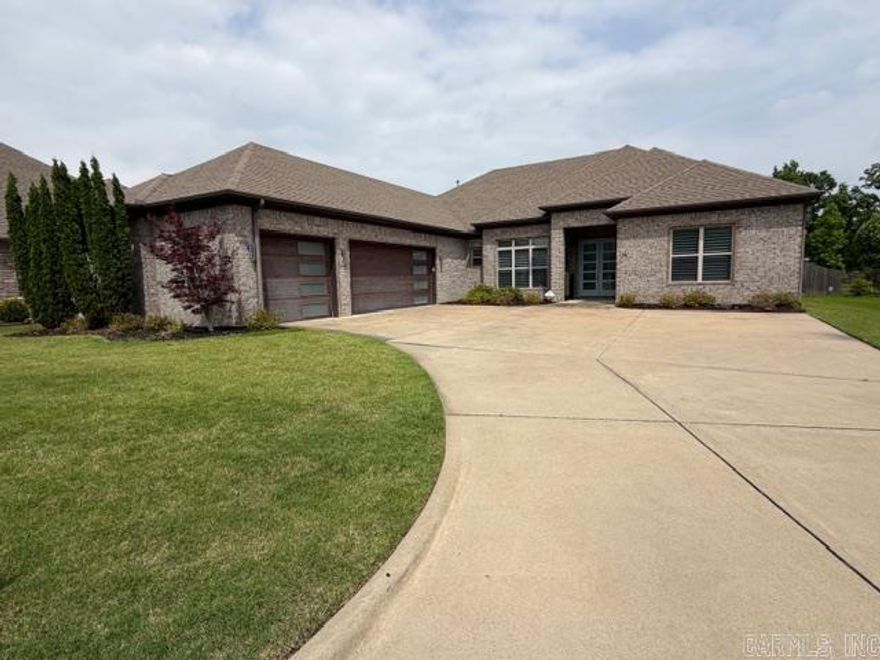 Custom-built, one-level home tucked away in a quiet cul-de-sac—truly one of a kind. Step through double front doors into a bright, open layout that seamlessly connects the kitchen, great room, and dining area, perfect for both everyday living and entertaining. This home features plantation shutters throughout, all tile flooring (no carpet), granite countertops, and stainless steel appliances. The kitchen is a standout/ barn door to a spacious pantry/ custom cabinetry/ complete with glass-front upper cabinets. The primary suite is a private retreat, featuring its own office with direct patio access. The luxurious en-suite bathroom includes a custom-built walk-in shower (no glass door) and even a built-in TV. From the bathroom, you’ll enter an extraordinary custom closet with built-in dressers, which conveniently leads to a thoughtfully designed laundry room/complete with ceiling-height cabinetry and sink. Enjoy outdoor living on your private patio, featuring ceiling fans and a beautiful wood ceiling, all overlooking a serene, iron-fenced backyard with views of a peaceful creek and wooded landscape. This exceptional home offers a rare combination of comfort, design, and privacy.