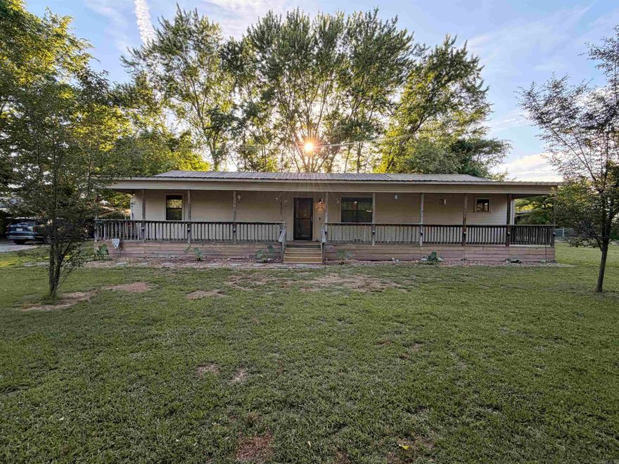 Space to Live. Room to Grow. This 3-bedroom, 2-bathroom ranch sits on 1.81 fully fenced acres. A rare combination of comfort, function, and genuine country character just minutes from the city. Covered porches front and back invite you to slow down and take in the quiet. Inside, the layout is easy and livable. Outside, the property does the heavy lifting: three horse stables, a dedicated roaming area, and a ready-built chicken coop make this a natural fit for equestrian enthusiasts, hobby farmers, or anyone ready to embrace a more self-sufficient lifestyle. Beyond the home itself, the amenities set this listing apart. A large workshop with a bathroom and laundry hookup handles serious projects and storage with ease. A fully finished “She Shed” climate-controlled with its own bathroom works equally well as a private retreat, home office, or guest quarters. A barn adds further storage, and an on-site storm shelter rounds out the package. Versatile. Move-in ready. Call for your showing today!!