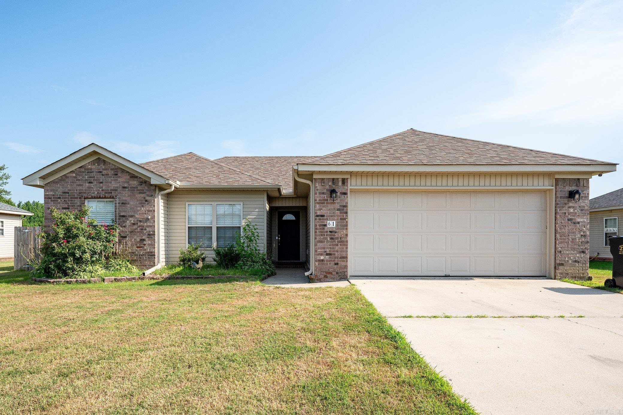 Come check out this great home located in Ward, AR. This property includes three bedrooms and two full bathrooms. You are welcomed with a large living area that is flooded with natural light and has a tray ceiling. The kitchen is complete with SS appliances and a large pantry. The primary suite is separate and has a jetted tub, double vanity, a walk-in shower and walk-in closet. The large backyard is fully fenced and has a lovely, covered patio and a play set for the children. The large laundry room and oversized garage with extra storage area or could be a workspace. This turn-key property is ready for you to make your home just in time for the holidays. Don't forget to walk over and take a look at the relaxing neighborhood lake. NEW ROOF, FENCE, LIVING ROOM FLOORING and HVAC in 2022. New paint 10/2024.