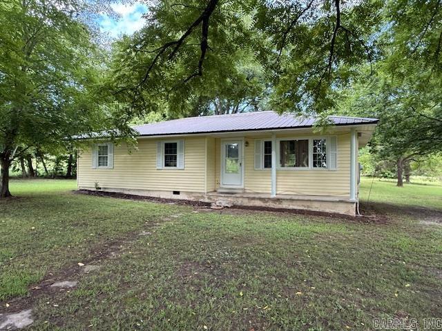 COUNTRY: PURE AND SIMPLE! Come home to PASTORAL PERFECTION in this 3-bedroom, 1-bathroom home nicely situated on 12.21 ACRES! Located minutes from Batesville, this adorable home would make an ideal mini farm. COMPACT BUT NOT CONFINING, the open floor plan makes every square inch count. Step saver kitchen with small island offers ample storage and countertop space. All 3 bedrooms provide plenty of space for sleep and storage. HAVE HOBBIES? The shop and pole barn offer endless possibilities! This property may look small, but it lives BIG! Call today, this property is PRICED RIGHT!