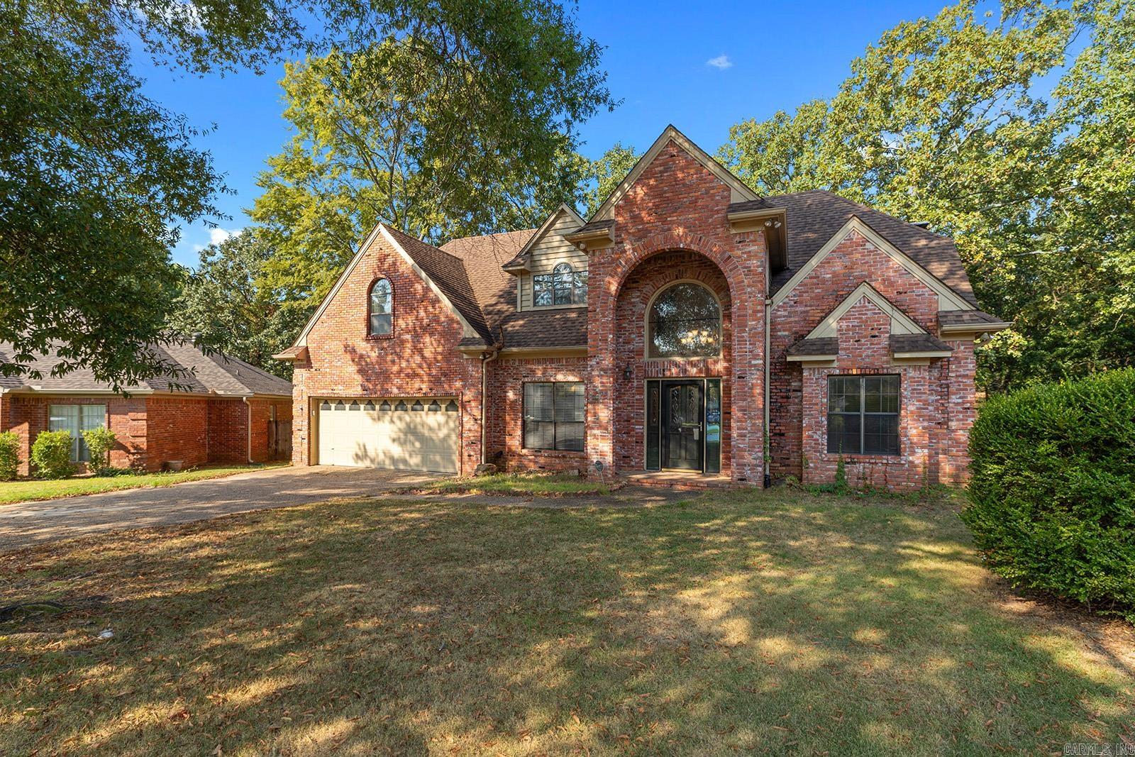 Welcome to 8 Edgewater Cove in Maumelle! This spacious home, crafted by Lynn Dickey, is nestled in the desirable Edgewater subdivision on a quiet cul-de-sac with short distance from Lake Willastein. Featuring 4 bedrooms, 2.5 bathrooms, plus an office, this home offers an abundance of built-ins and storage throughout. The updated kitchen boasts quartz countertops, a large island, and a built-in deskāperfect for both cooking and everyday living. The inviting living room includes a cozy fireplace with gas logs, enhanced by beautiful hardwood floors that flow through much of the main living spaces, adding warmth and elegance. Step outside to a large deck overlooking the fully fenced backyard, complete with a storage shed for added convenience. For hobbyists or DIY enthusiasts, the garage includes an awesome shop space thatās ready for your projects. This is more than a home, itās a lifestyle. Opportunities to own in Edgewater donāt come around often. Donāt miss your chance to make this one yours!