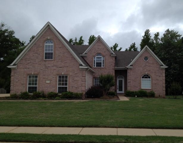 Looking for that special home with 4 bedrooms, 2 1/2 baths with a view of the lake? Great room and formal dining has fireplace & beautiful wood floors! Master suite has whirlpool tub & separate shower, double sinks & walk in closet. All new carpets in bedrooms. Chef's kitchen has island & solid surface countertops and stainless appliances. Fourth bedroom is large enough to be a game room. Large backyard and playset stays. Side-load garage & extra parking space.