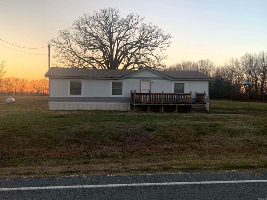 Listed price is with 3/4 acre with ability to increase acreage to 6.5 or 10.88 acres with increased price. On Permanent foundation with certification,  3 Br, 2 Bath 28' x48' Double Wide home located in the country.  Located In Prairie County, Centered around Carlisle, Hazen, Des Arc and Hickory Plains. A 1,344 Sq ft home with a Camera Security system that can be accessed and viewed remotely. CHA, Propane Heat and cooking and an Electric water heater Utilities are 1st electric, Connect2 fiber internet, Des Arc Public water and on septic. This property has been recently surveyed. Viewed by appointment only. The propane tank on the property is a rental tank through MFA. Home comes with a clear title. There is no owner financing, no leasing, and is not a rent to own property. It is also agent owned. Look for our sign at the entrance if you have any questions and / or want to setup a viewing. Thank you for viewing our property