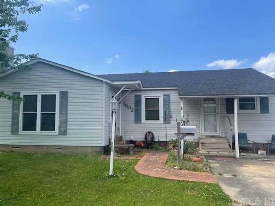Great little starter home  or downsized to meet you needs.  The home has a RV carport in back along with 2 metal sheds for storage .  A welcoming front to a eat in kitchen next to laundry room and storage space.