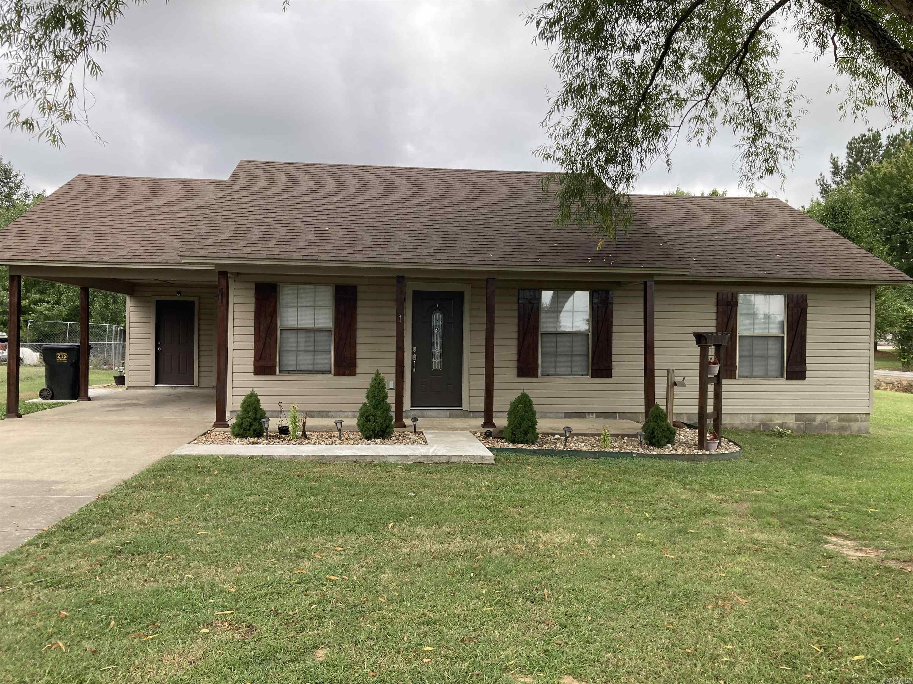 Welcoming 3 bedroom, 2 bathroom house on a large corner lot. Covered front porch perfect for relaxing and watching the sunset. Hard floors throughout, stainless steel appliances, separate laundry area, storage room off of the carport and a 10x12 storage shed/workspace with electricity! This house has so many updates and is ready to be your home today! *Pictures of new flooring to come soon **Edge Realty is proud to offer deposit-free living to qualified renters through Obligo! We understand that moving costs can add up, so we want to extend financial flexibility to our residents. Learn more about the benefits of deposit-free living with Obligo at myobligo. com.
