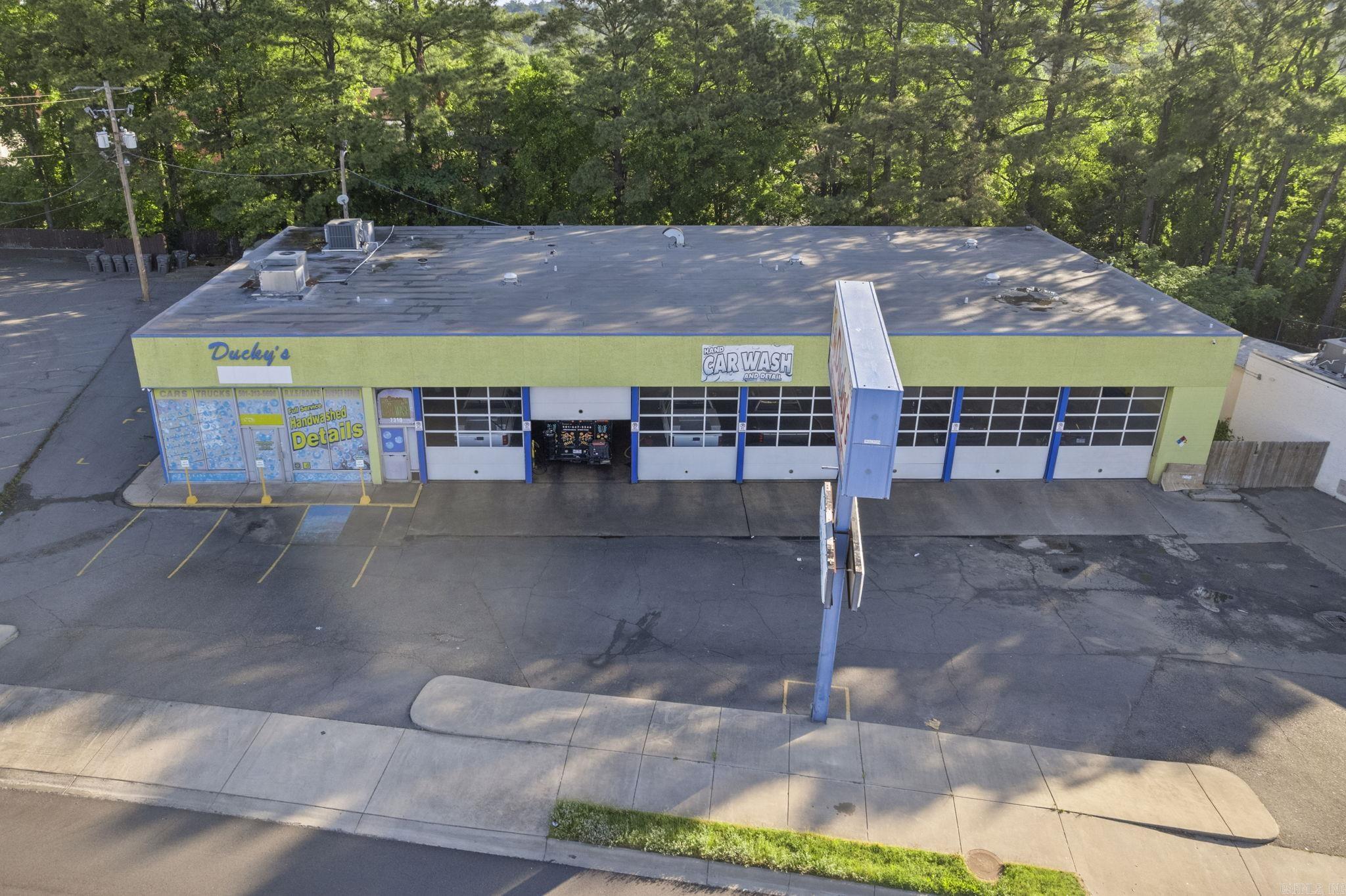 This property is for LEASE. Prime location in the heart of Little Rock on Cantrell. Very high traffic flow!! Large retail/lobby space. SEVEN bays. All situated on a little over a half an acre.
