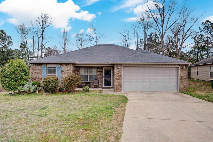 Big Backyard with view of lake!  Cutest 3 bedroom, 2 baths await you.  Living room opens to kitchen dining.  Tray ceiling in primary bedroom and laminate flooring.  Pretty backsplash in kitchen.  Hurry to see it.