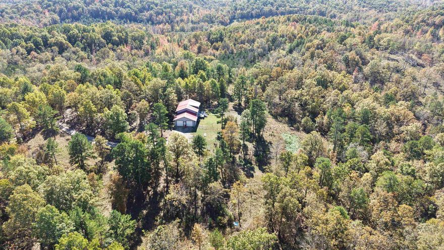 Home with 10 Acres for Sale in Melbourne, Arkansas – 3 Bed, 2 Bath Country Home with Mountain Views in North Central Arkansas. This beautiful 3 bedroom, 2 bathroom home on 10 acres in Melbourne, Arkansas, located in the heart of North Central Arkansas and just 5.4 miles from town. This property offers the perfect combination of country living with land, privacy, and convenience, making it ideal for buyers searching for homes with acreage in the Ozark Mountains. Situated on a scenic mix of open pasture and wooded land, this property provides endless opportunities for gardening, hobby farming, hunting, recreation, or building additional structures. Enjoy breathtaking Ozark Mountain views, abundant wildlife, and the peaceful setting that rural Arkansas is known for—all while being just minutes from schools, shopping, dining, and medical services in Melbourne. This spacious 2,400 square foot home features a two-car garage and a warm, inviting country atmosphere with numerous updates throughout. Recent improvements include a new central heat and air system with heat pump, new kitchen appliances (all included), and a gas water heater.  Priced to sell at $299,900