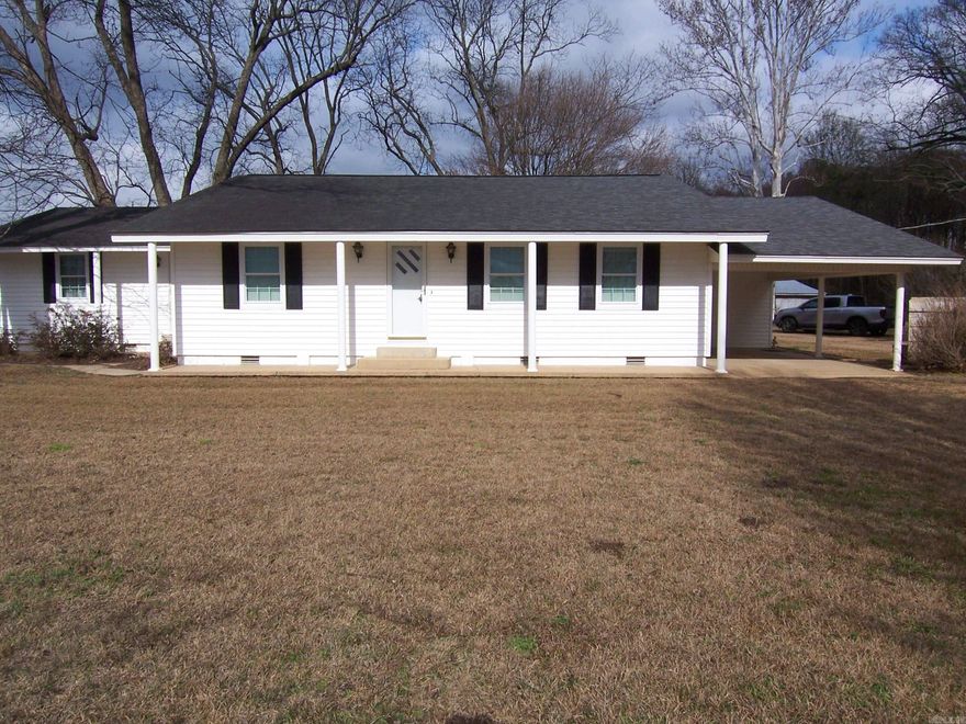 This is a nice older home that has been well maintained consisting of 2129 square feet of heated and cooled living area. The home offers three bedrooms and two bathrooms with a large living room. The home sits on 5.22 acres of beautiful loans the joins the Bayou. The home has a portable building 12 x 28 feet and a metal building that could be used for multiple purposes.
