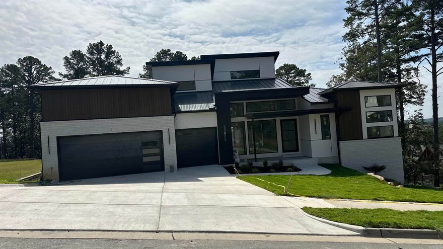 Fantastic Modern 4 bedroom 3.5 bath beautiful home double decks off back of home, 3 car garage, unfinished basement, tons of storage, built ins wonderful kitchen