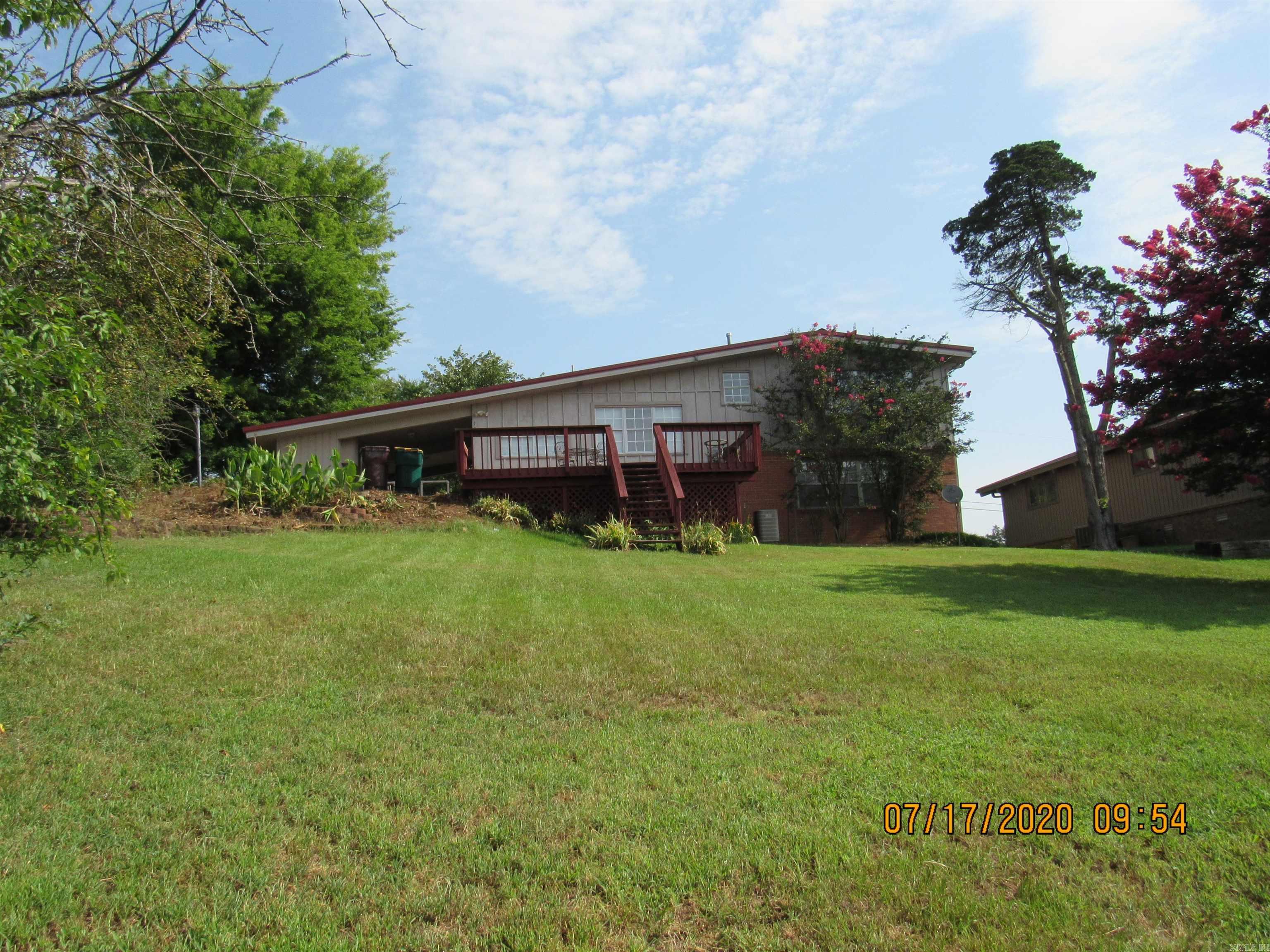 Older split-level home in the heart of Morrilton, great view off the back deck, split level 3-bedroom home, 2 living areas, laminate, tile & carpet flooring, all kitchen appliances including refrigerator, freshly painted interior in 2025, 1 car carport. Recently painted exterior and updated deck in August 2022. Lawn Care Included! Small pet negotiable with a non-refundable pet fee. ***PLEASE NOTE WE DO NOT ADVERTISE ON CRAIGSLIST OR FACEBOOK MARKETPLACE. ANY LISTING OF OURS SEEN IS A SCAM!!!***