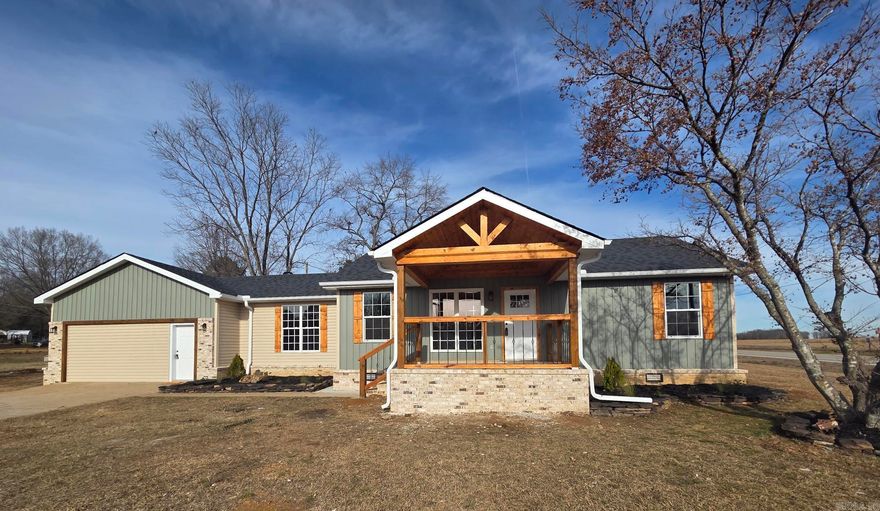 Remodeled & added onto 4-bedroom, 3 baths all electric house with extra movie/game room just outside Searcy city limits! All new plumbing, electrical, HVAC, water heater, cabinets, flooring, stainless appliances, granite counter-tops, roof & more on a 1/2-acre lot. This house also has a storm shelter accessed from inside, separate laundry, covered front porch with wood beams & lots of space. Master bath has a barn door, a custom walk-in shower with glass panels & door & dual sinks. The kitchen has tile backsplash, granite countertops, pantry, island with bar, sink & dishwasher. A pot filler has been added above the stove. NO carpet! Great layout for large or extended family with bedrooms & baths on 3 sides. See agent remarks.