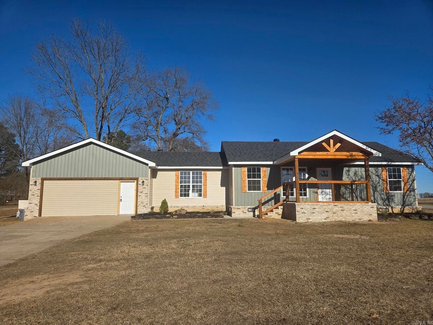 Remodeled & added onto 4-bedroom, 3 baths all electric house with extra movie/game room just outside Searcy city limits! All new plumbing, electrical, HVAC, water heater, cabinets, flooring, stainless appliances, granite counter-tops, roof & more on a 1/2-acre lot. This house also has a storm shelter accessed from inside, separate laundry, covered front porch with wood beams & lots of space. Master bath has a barn door, a custom walk-in shower with glass panels & door & dual sinks. The kitchen has tile backsplash, granite countertops, pantry, island with bar, sink & dishwasher. A pot filler has been added above the stove. NO carpet! Great layout for large or extended family with bedrooms & baths on 3 sides. See agent remarks.