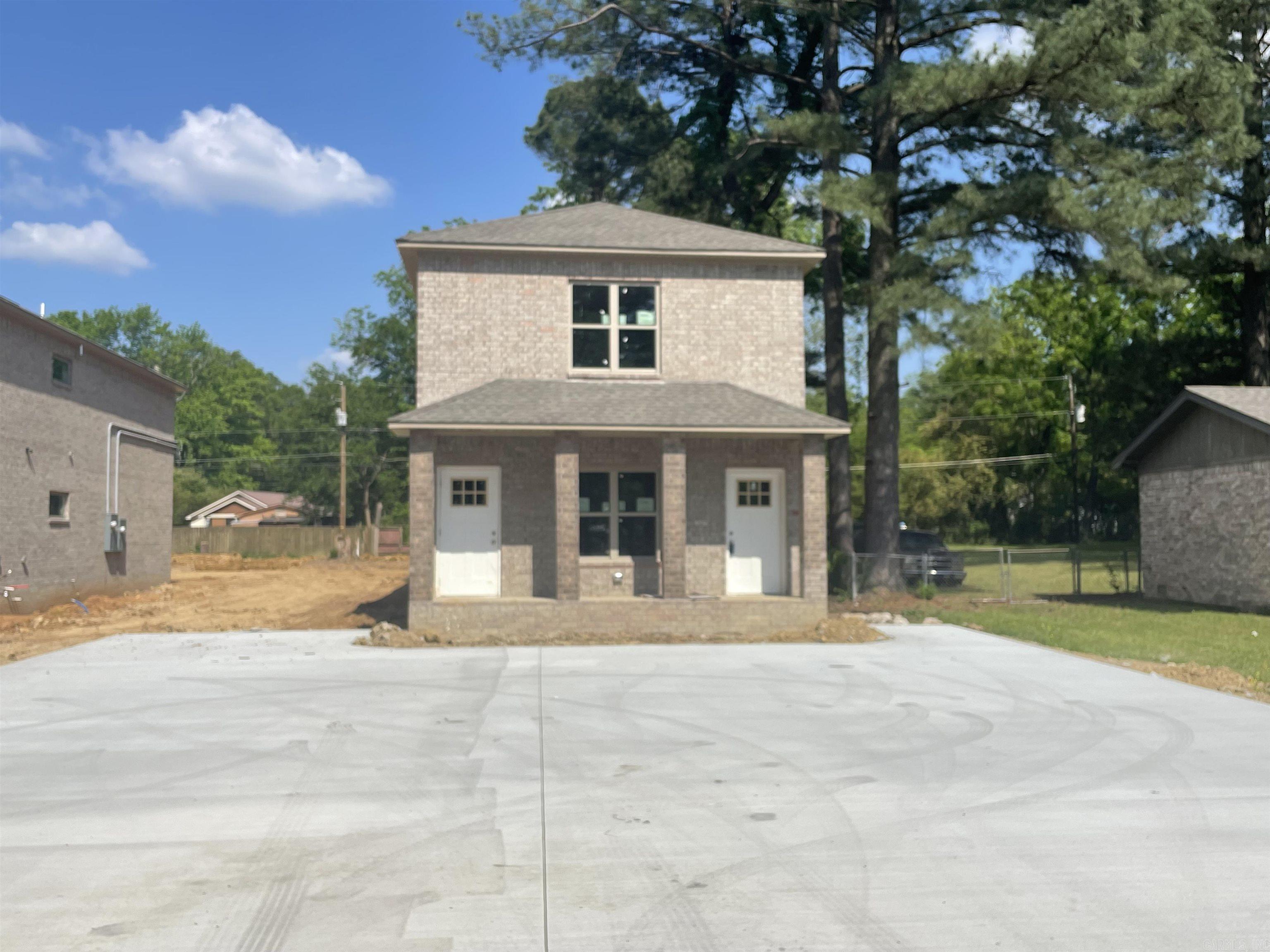 BRAND NEW DUPLEX convenient to all the best Central Arkansas has to offer! Less than 5 miles to Little Rock Air Force Base and fifteen minutes from downtown Little Rock! FULL 3 bedroom/2 bath, one downstairs and one up. Eight and nine foot ceilings with a full brick exterior. Each floor has waterproof vinyl flooring throughout and a full laundry room. Walk down the hall to the two bedrooms with ample closet space. Primary bedroom at the back of the building with its own large closets and bathroom. Estimated completion is end of June 2023. Please see AGENT REMARKS! This is the first of 2 duplexes in a row for sale. Also listed together at MLS #23010571