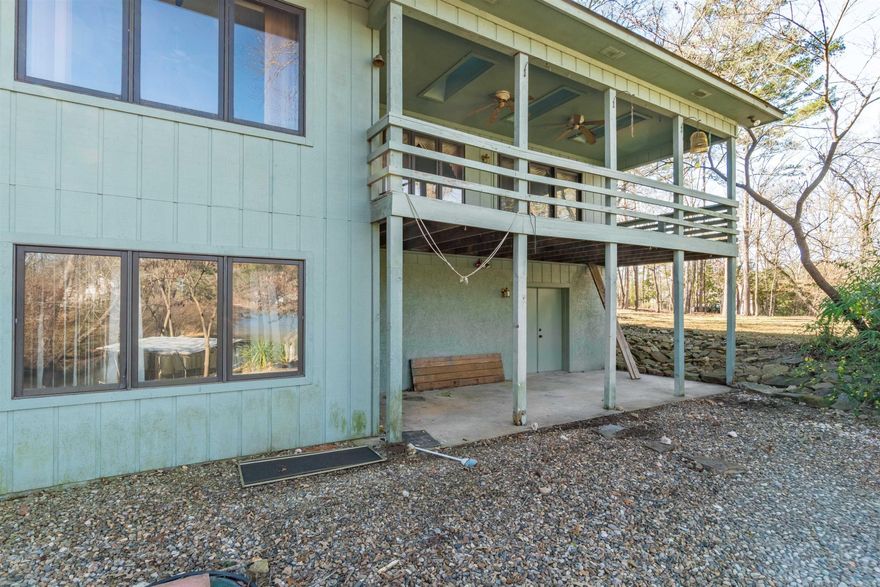 SOLD AS IS.  INVESTORS ATTENTION.  ON LAKE CORTEZ.  LAKE FRONT.   NEEDS SOME LOVE.