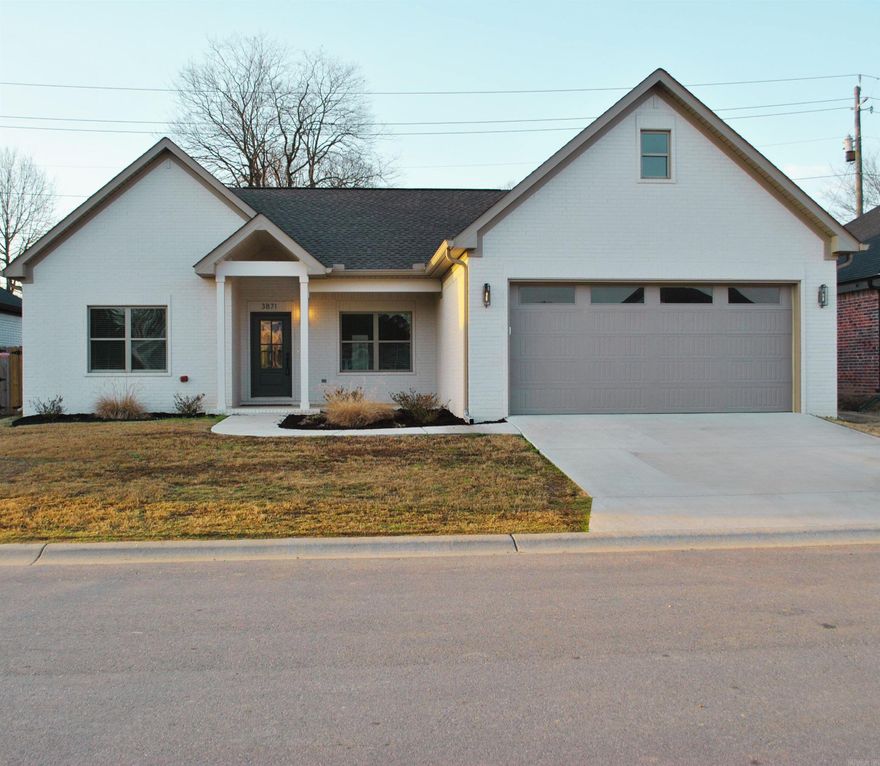 Step into this beautifully newly designed home featuring a desirable split floor plan and an inviting open-concept living and dining area. The spacious kitchen is truly the heart of the home, offering abundant cabinetry, quartz countertops, laminate flooring, and custom design finishes that blend style and functionality.The private primary suite is thoughtfully positioned and showcases an elegant ensuite bath complete with a large walk-in tile shower and an oversized walk-in closet that conveniently connects directly to the laundry room.Step outside to enjoy the fenced backyard, offering a cozy yet private setting.This home combines thoughtful design, modern finishes, and functional living spaces — ready for its next owner to make it their own!