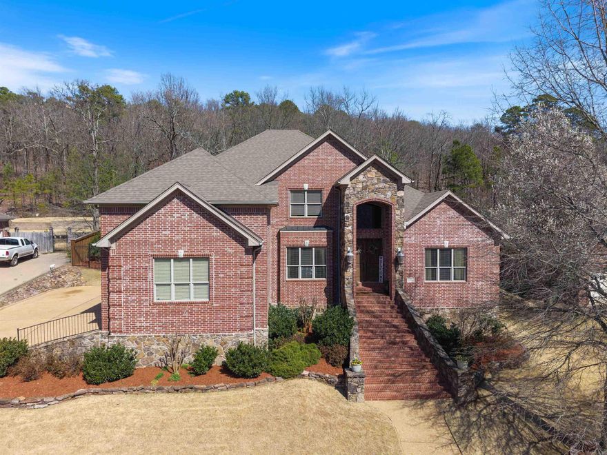 Spacious Family Home in a Peaceful Cul-de-Sac! Welcome to this beautifully maintained 4-bedroom, 3.5-bath home, perfectly designed for comfortable family living. The main-level primary suite offers a large, recently updated bathroom with stylish new flooring and fixtures (2023). Upstairs features three additional bedrooms, two full baths, and a versatile second living area equipped with a sink and mini fridge — ideal for movie nights, teen hangouts, or a cozy guest retreat. Step outside and unwind in the stunning tiered backyard, complete with two firepits, elegant landscape lighting, and a charming swing nestled near a tranquil green space — your own private outdoor sanctuary. The dedicated office features vaulted ceilings, built-in shelving, and an included desk, offering a bright and productive workspace. Recent updates include a new hot water heater (2022), downstairs AC unit (2024), interior paint (2023), and new garage doors on the spacious 3-car garage (2022).Located in the welcoming Villages of Wellington with fantastic amenities: enjoy access to a park, pool, tennis courts, & a community pond. True gem for families seeking space, comfort and connection.