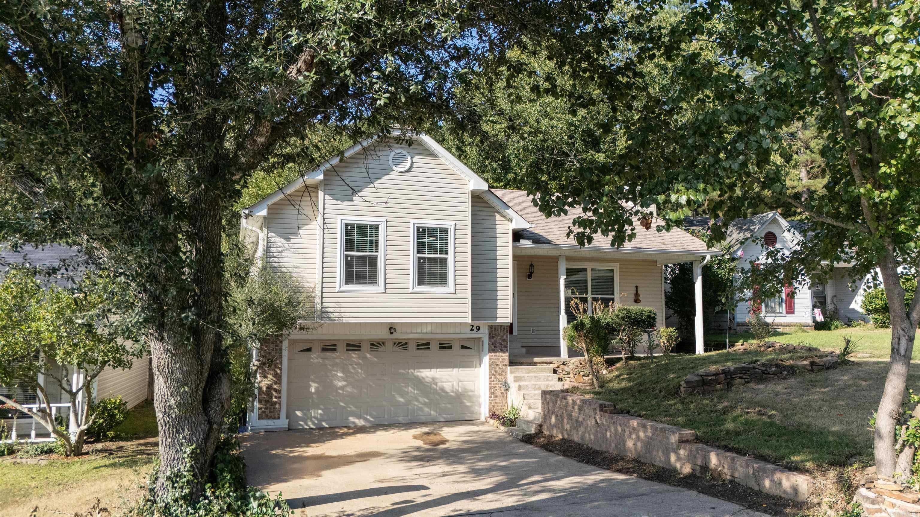 Welcome to an amazing updated home in Oak White Village Neighborhood. Great rooms with a fireplace in the open space and two car garage. Nice kitchen with beautiful counter tops, new gas stove with dishwasher. Wonderful deck with a fenced in backyard and a fire pit.