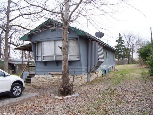 Your magic touch needed on this fixer upper. Could be a money maker as a rental. 3 bedrooms, Laundry with washer and dryer, stove and refrigerator included. Laminate floors throughout. Shed in the yard for your mower.