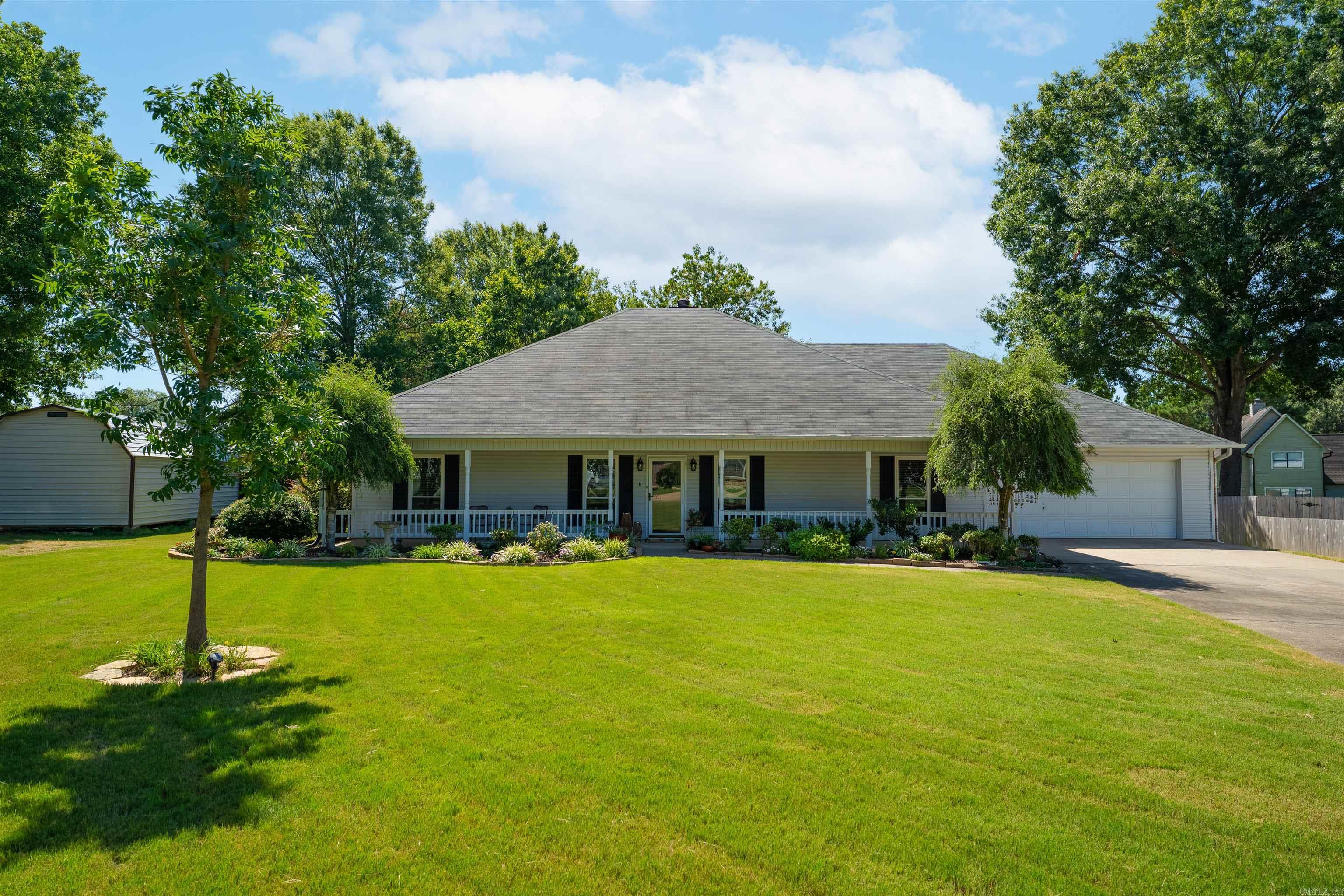7 minutes from LR Airforce Base - Featuring tons of updates & upgrades Step inside to a bright and welcoming living room with a cozy gas fireplace and large windows that fill the space with natural light. Flowing from the living room is the dining area, conveniently located next to the kitchen. The kitchen has been thoughtfully updated with white quartz countertops, fresh tile, a built-in stove, and a refrigerator that can stay with the home. Off the kitchen, you’ll find a sunroom that makes the perfect office or flex space—bathed in natural light and offering stunning views of the lush backyard, complete with fresh landscaping and a newly painted deck. The private owner's suite is tucked away behind the kitchen and includes an oversized closet, an updated bathroom, and a relaxing jetted tub. Two additional bedrooms are located on the opposite side of the home, along with a full guest bath featuring double vanities. Don’t forget the dedicated laundry room and two-car garage—this home truly has it all!