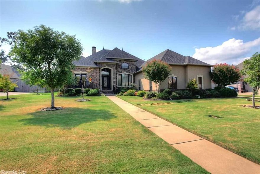 Beautiful home built by Elder Custom Homes. Formal living are with built in shelving and formal dining room.  Fabulous kitchen with island, including prep sink, large pantry, double ovens, Jenn-Aire 6 burner gas cook top.  2 fireplaces, one gas logs and one is wood burning.  Office with wet bar and ice maker.  Recirculating water heater.  Large hearth room, 6" hand scrapped wood floors.  Fabulous must see to appreciate.  T.V.'s and stereo equipment to convey.  Wall desk in back bedroom and refrigerator.