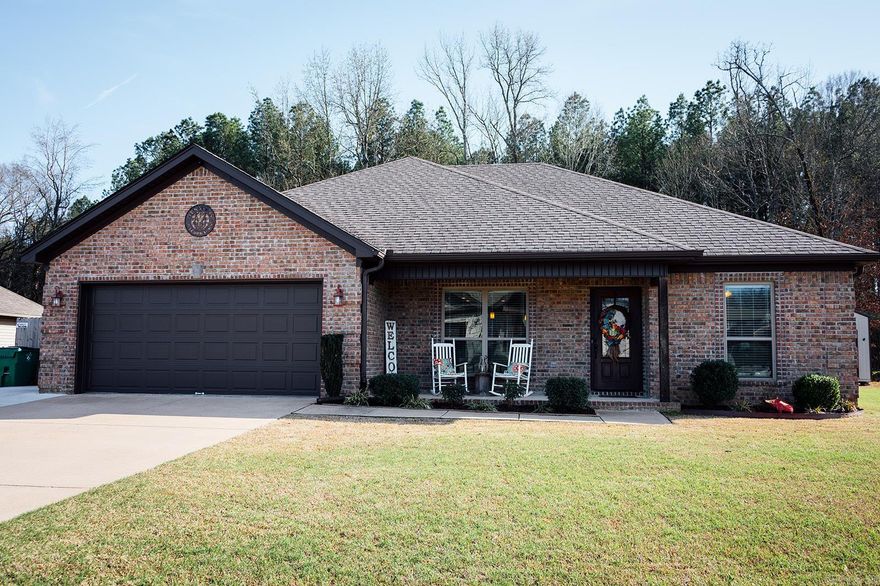 Your new home awaits! Perfect for starter home or downsizing! Located in Cross Creek subdivision in Austin. This three bed 2 bath home is a split floor plan with open concept. Large primary with primary suite. Granite counter tops and hardwood floors throughout except two guest bedrooms. Covered patio perfect for back yard entertaining or just watching a game. Extra driveway area for extra parking. Fully fenced in yard but extra yard to the side on the extra lot with a pond. Property also backs up to a wooded area. Also outside storage area with electric. BOOK YOUR SHOWING TODAY! AGENT SEE REMARKS