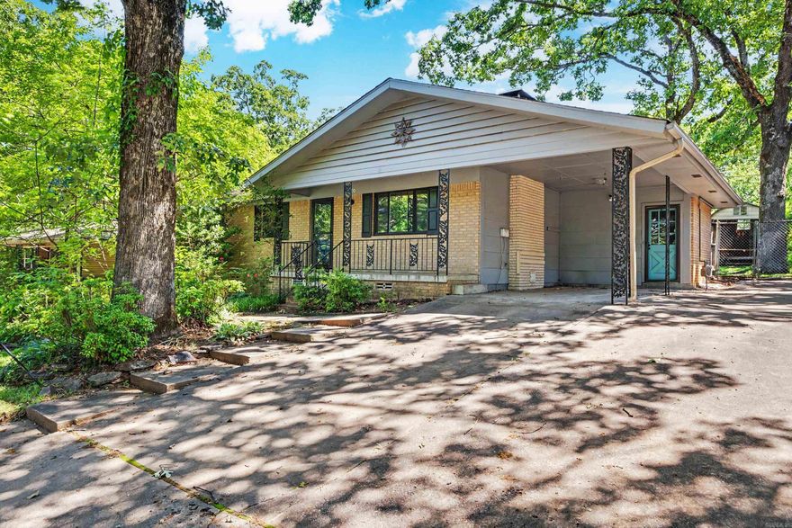 Fixer Upper in Lakewood - just 2 blocks from Crestwood Elementary!  This 3 bedroom/2 bath home with sunroom and laundry (not included in square footage) is ready for it's next chapter!  This home features a woodburning fireplace, original hardwood floors in living room and bedrooms, with an extra parking pad and a large back yard.  Selling AS-IS - Agents See Remarks