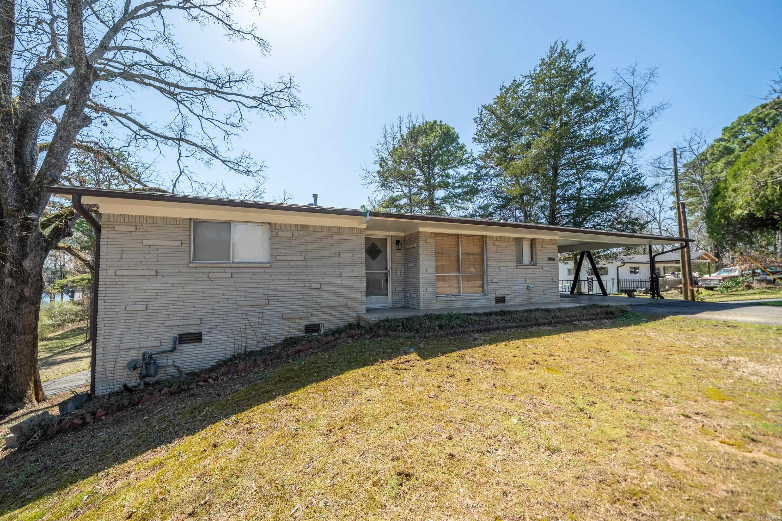 Step back in time with this charming 3-bedroom, 3-bathroom split-level home that channels the iconic style of the 1960s! Nestled in a peaceful neighborhood, this property boasts a large, fully fenced yard. This property offers plenty of space for comfort and privacy which includes a bedroom, living space and full kitchen downstairs and could also be considered "in-law quarters". The expansive fenced yard provides a fantastic opportunity for gardening, outdoor activities, or simply relaxing in your own private retreat providing lake views in the winter. This split level layout creates distinct living areas for added functionality. Close to parks, shopping, and dining options, making it ideal for families and commuters alike.