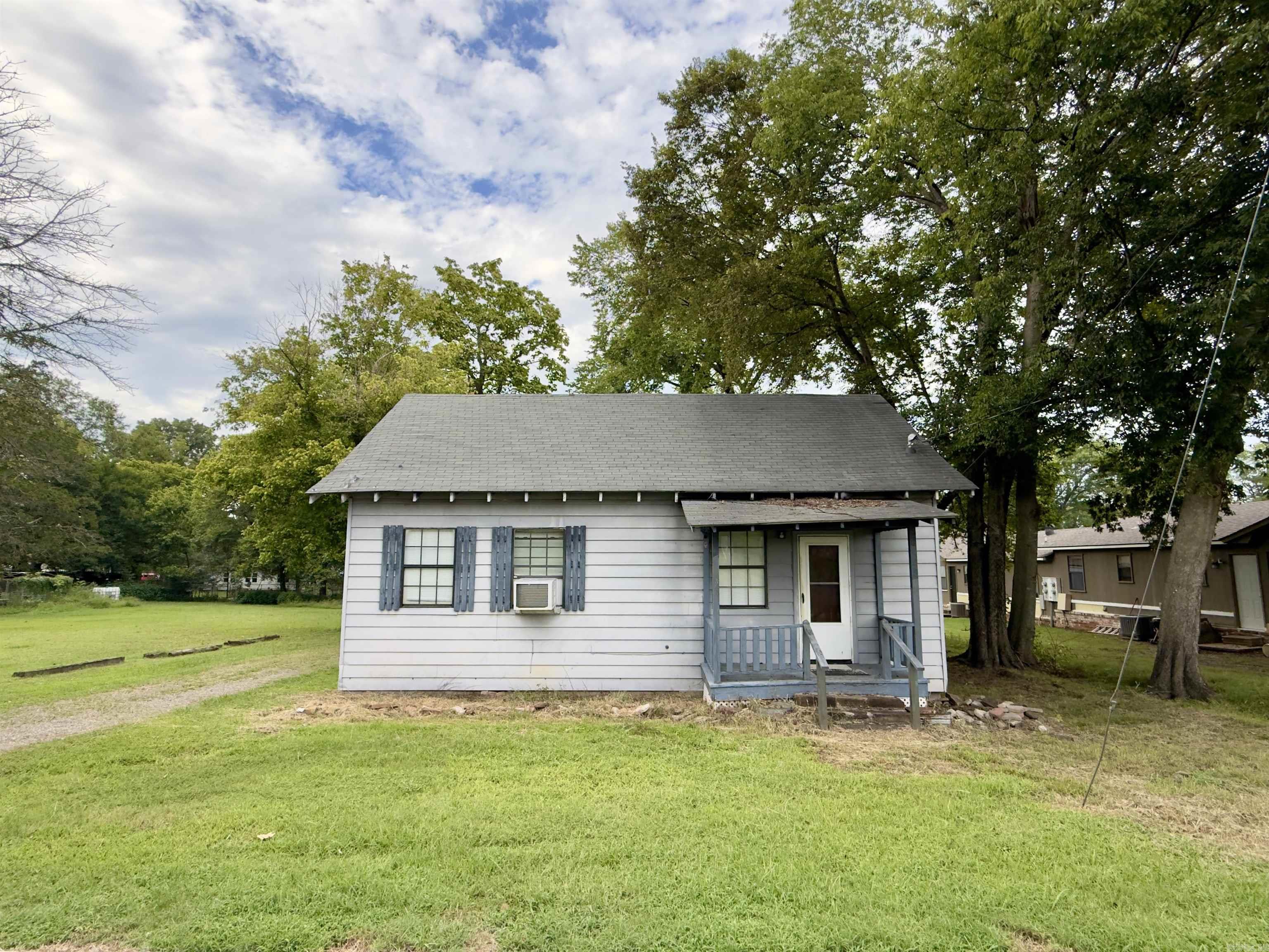 Just blocks from the Dover School District, this versatile 2-bedroom home (or 1-bedroom with flex space) offers charm and potential. The open-concept living and kitchen area creates a welcoming flow, while the covered front porch and screened-in back porch provide plenty space to relax and enjoy the outdoors. With a little TLC, this property could shine as a wonderful starter home or a smart investment opportunity.