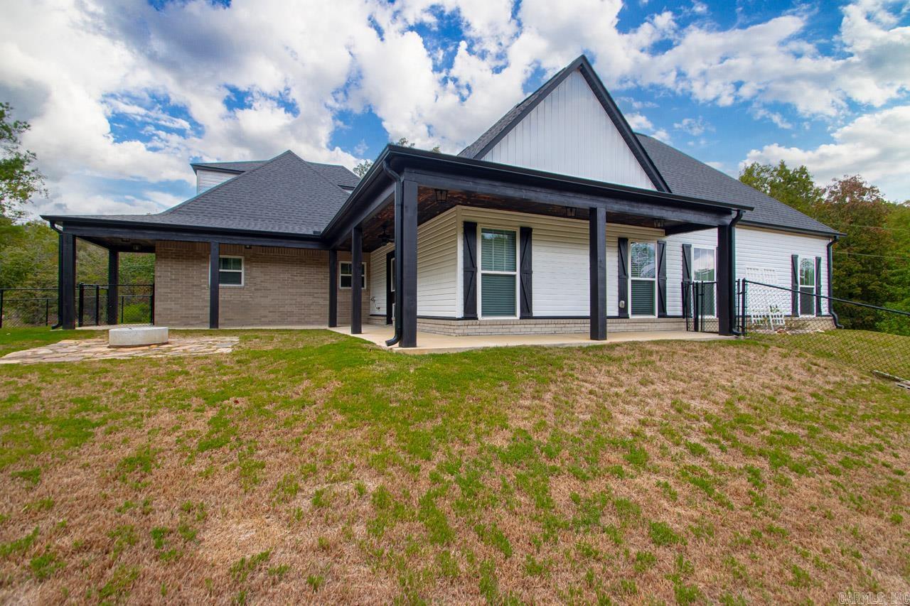 This beautiful home sits on over 5 acres and offers 3 bedrooms 2.5 bath split floor plan, tall ceilings, soap stone countertops, lvp flooring throughout main level, ss appliances, large covered patio, 2 fenced areas and a 40 x 60 SHOP!!!